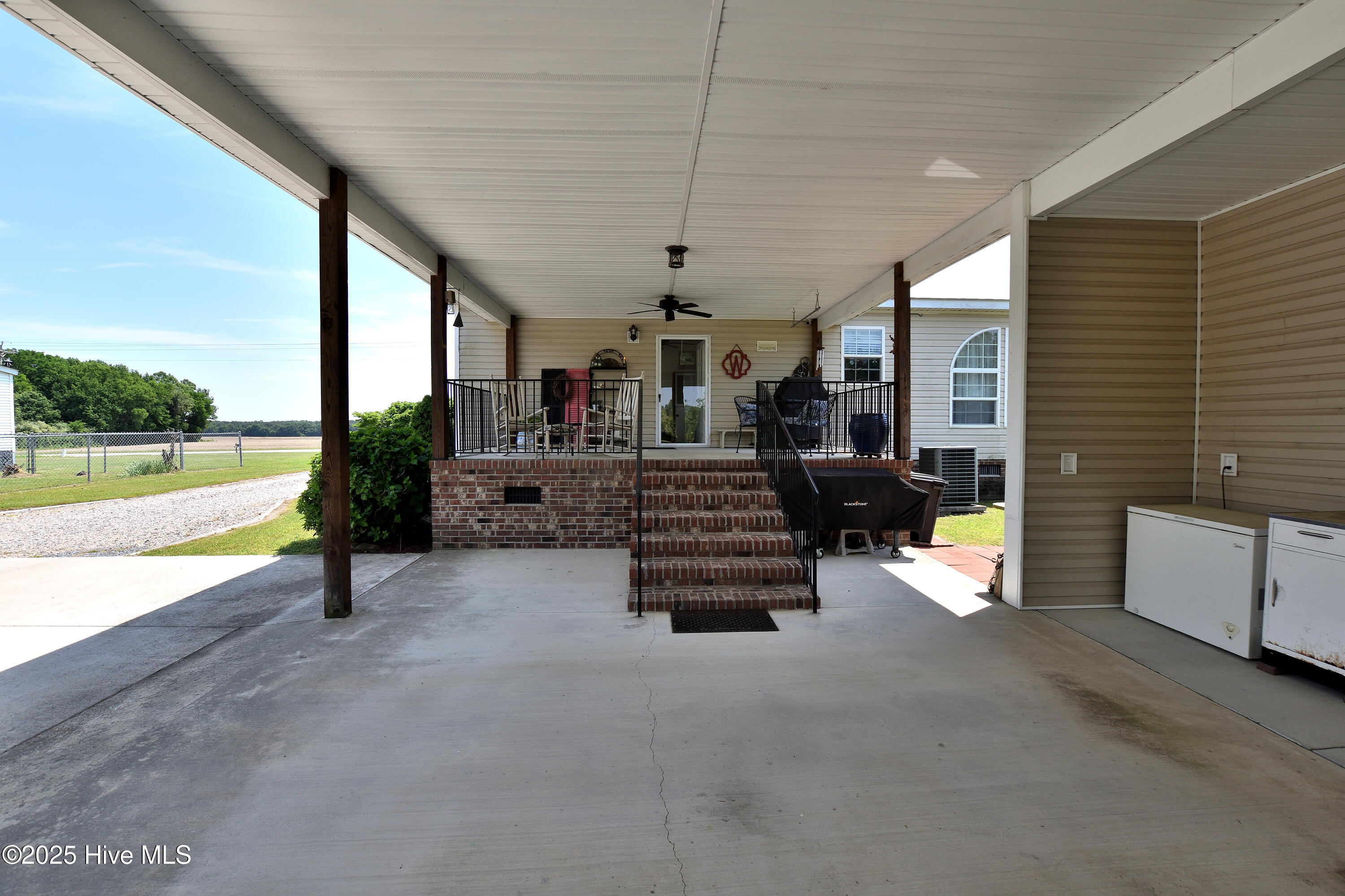 1424 Wood Duck Road Elm City, NC 27822 - Photo 27 of 38 Carport and back porch