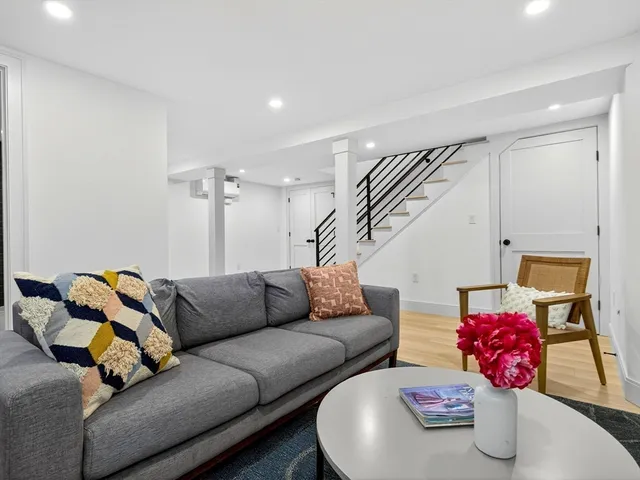 a living room with furniture and a couch