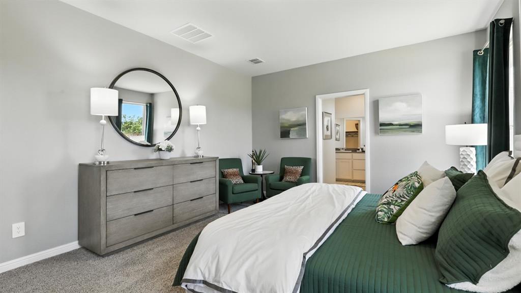 313 Potato Street Keene, TX 76059 - Photo 16 of 40 a bedroom with a bed and a dresser