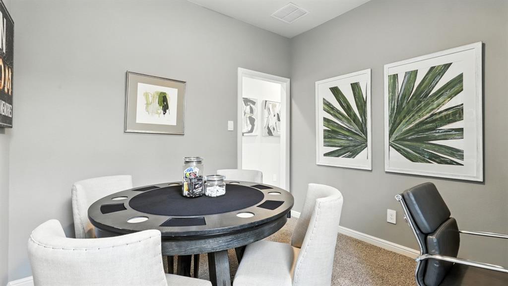 313 Potato Street Keene, TX 76059 - Photo 32 of 40 a dining room with furniture and window