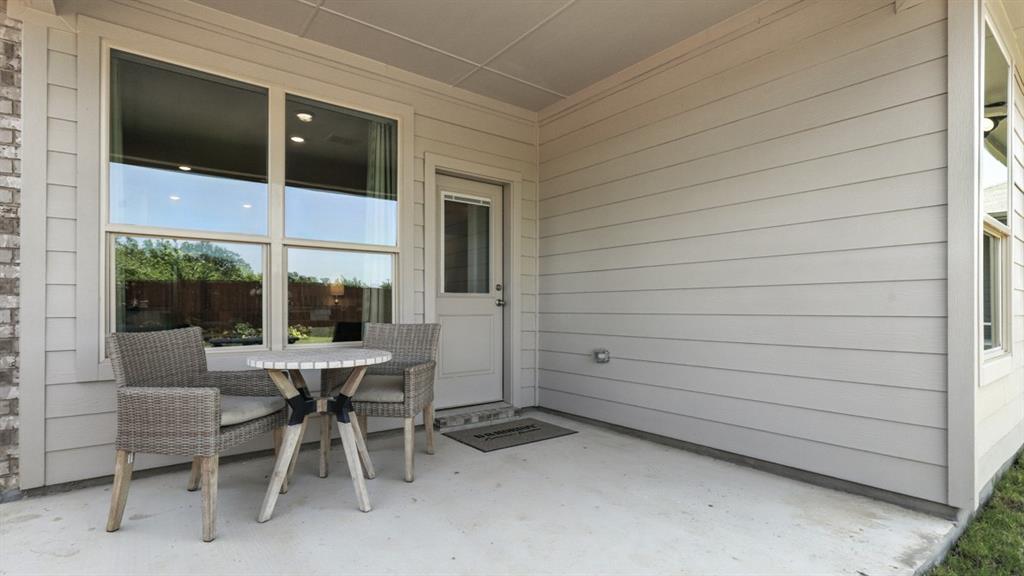 313 Potato Street Keene, TX 76059 - Photo 39 of 40 Patio - All Home and community information, including pricing, included features, terms, availability and amenities, are subject to change at any time without notice or obligation. All Drawings, pictures, photographs, video, square footages, floor plans, elevations, features, colors and sizes are approximate for illustration purposes only and will vary from the homes as built.