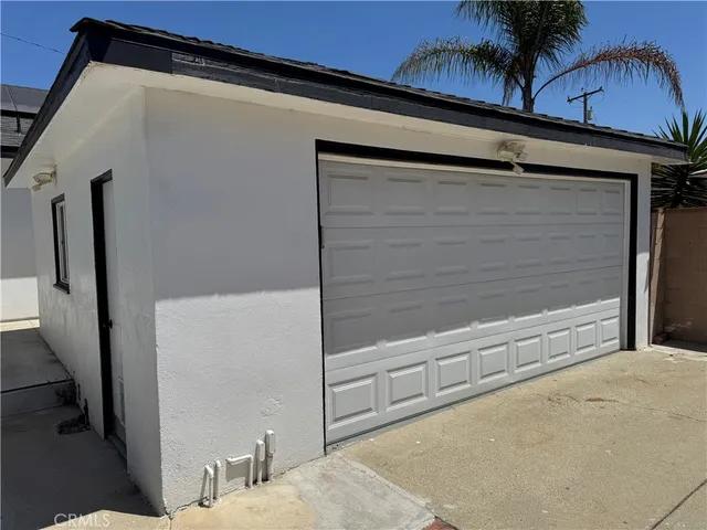 a black white building with a outdoor space