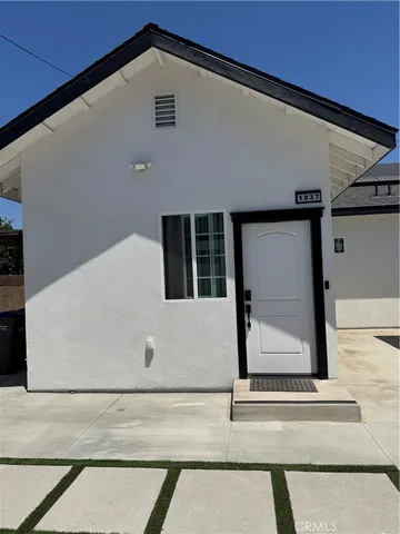 a front view of a house with windows