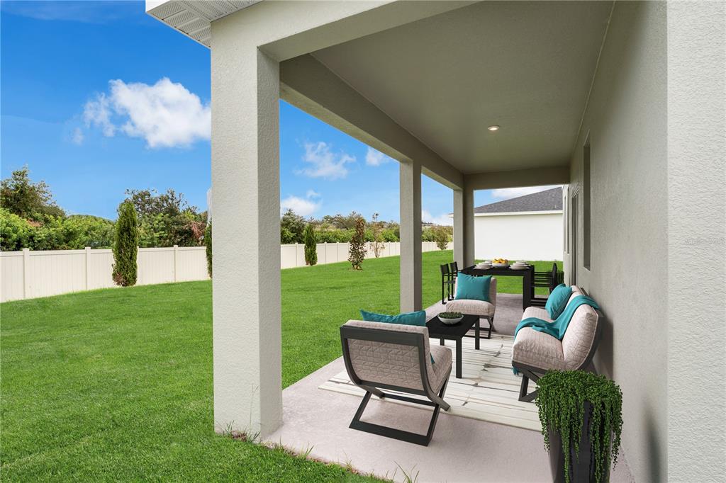 6032 Cliffbow Loop Leesburg, FL 34748 - Photo 20 of 31 a building outdoor space with patio furniture