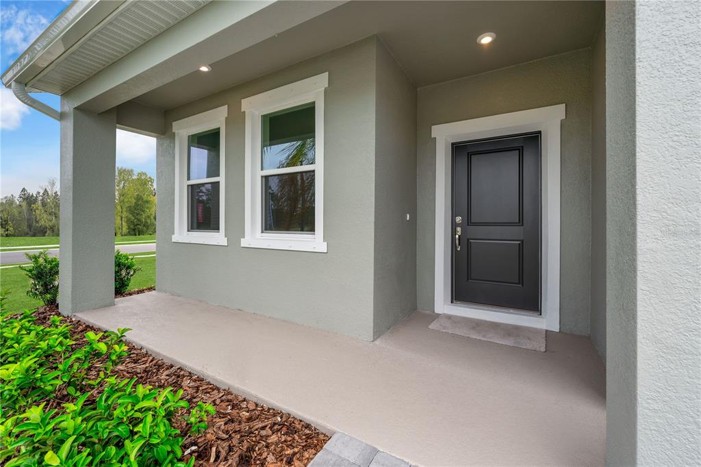 6032 Cliffbow Loop Leesburg, FL 34748 - Photo 4 of 31 a view of an entrance of the house