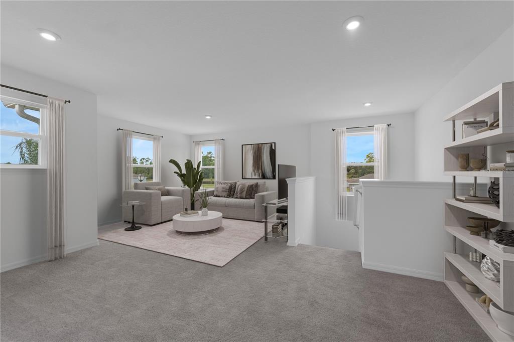 6032 Cliffbow Loop Leesburg, FL 34748 - Photo 10 of 31 a living room with furniture and a wooden floor