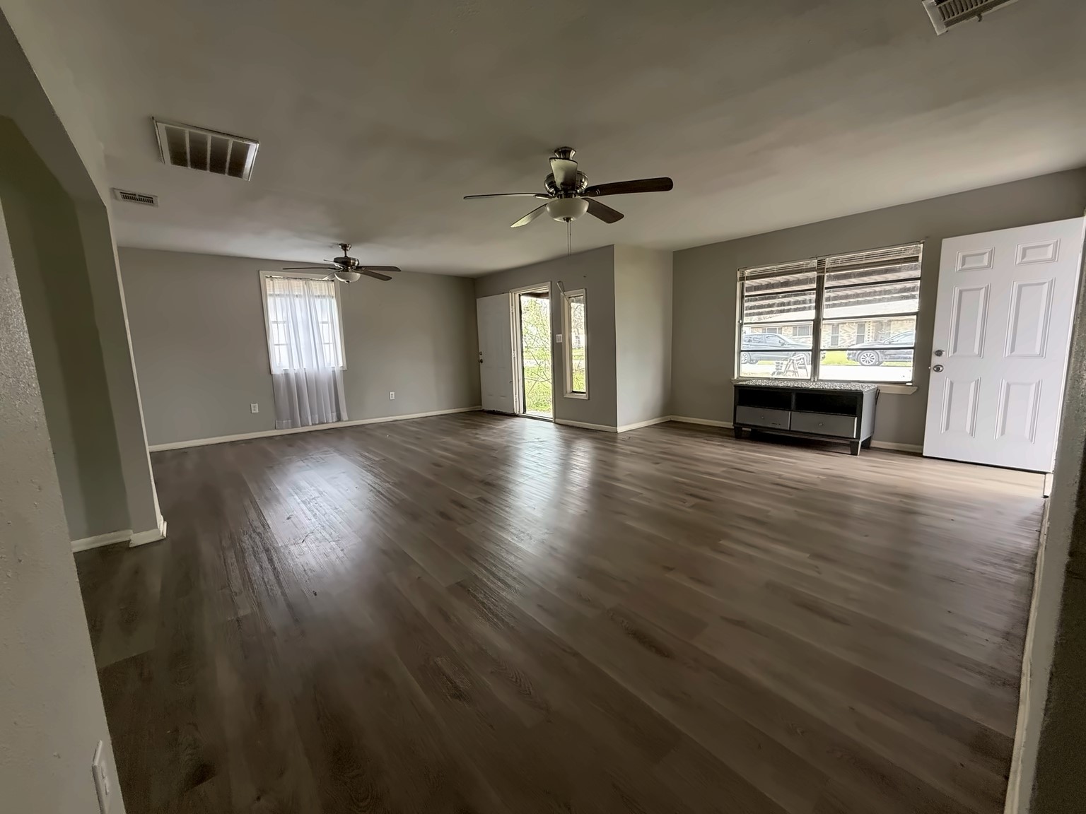 10341 Caxton Street Houston, TX 77016 - Photo 5 of 17 Bright and spacious living room with natural light.