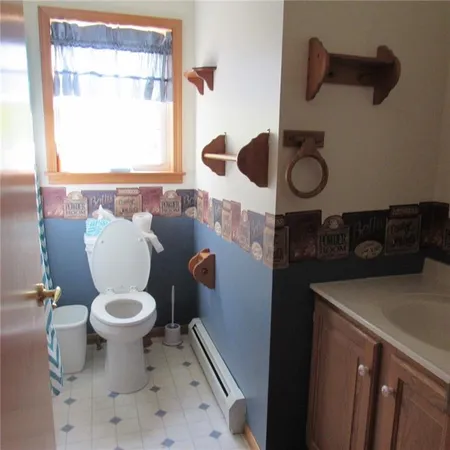a bathroom with a sink and a toilet