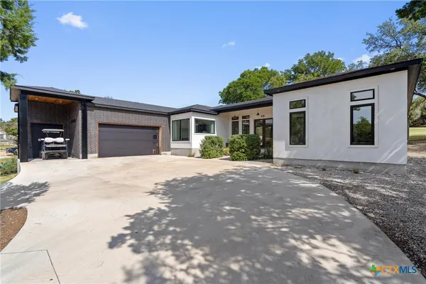 $744,900 | 418 Venture Boulevard South, Point Venture, TX 78645