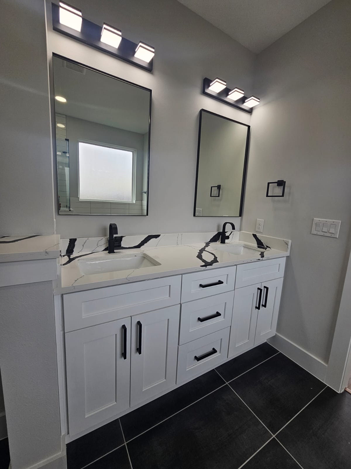 2413 Blue Sky Lane Lockhart, TX 78644 - Photo 25 of 39 Full bath featuring double vanity and dark tile patterned flooring