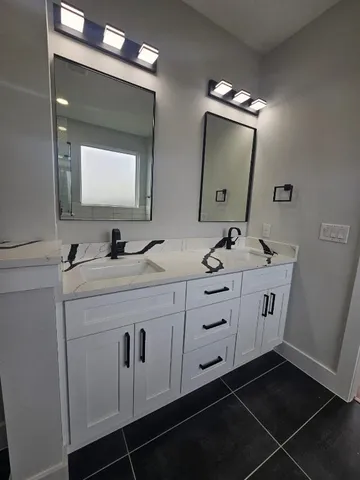 a bathroom with a bathtub and a shower