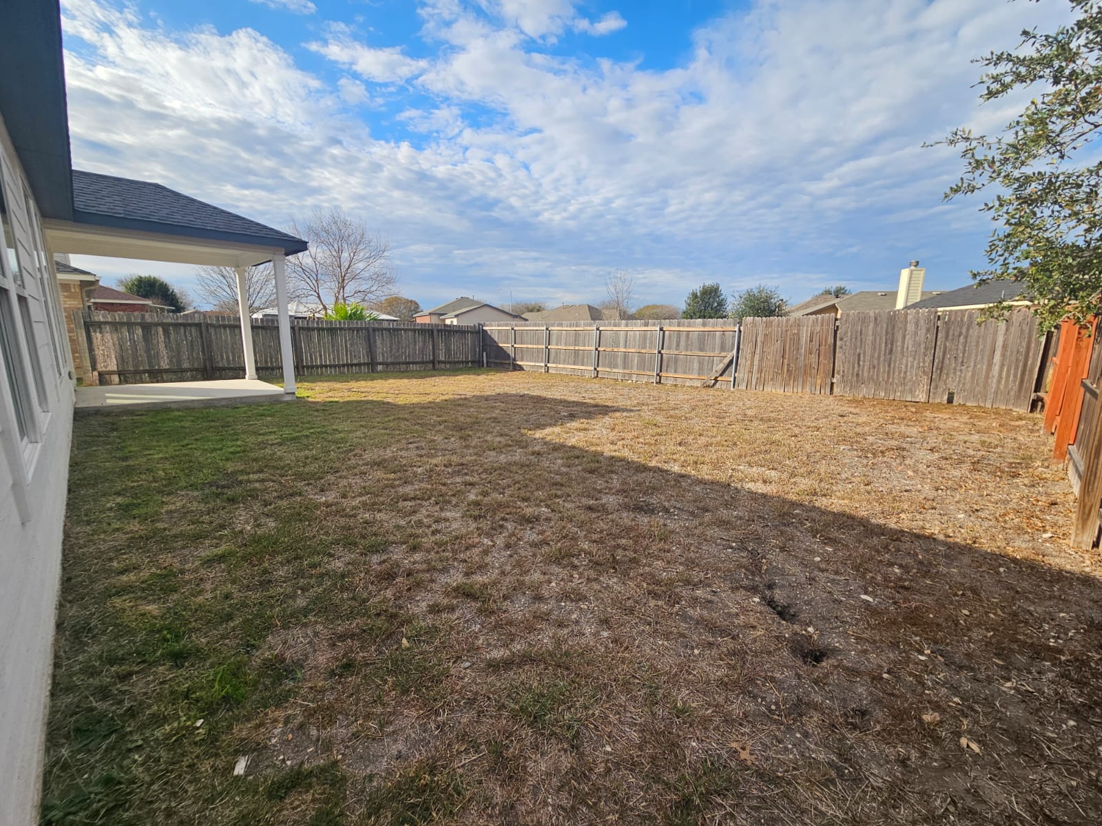 2413 Blue Sky Lane Lockhart, TX 78644 - Photo 38 of 39 Fenced backyard featuring a patio area