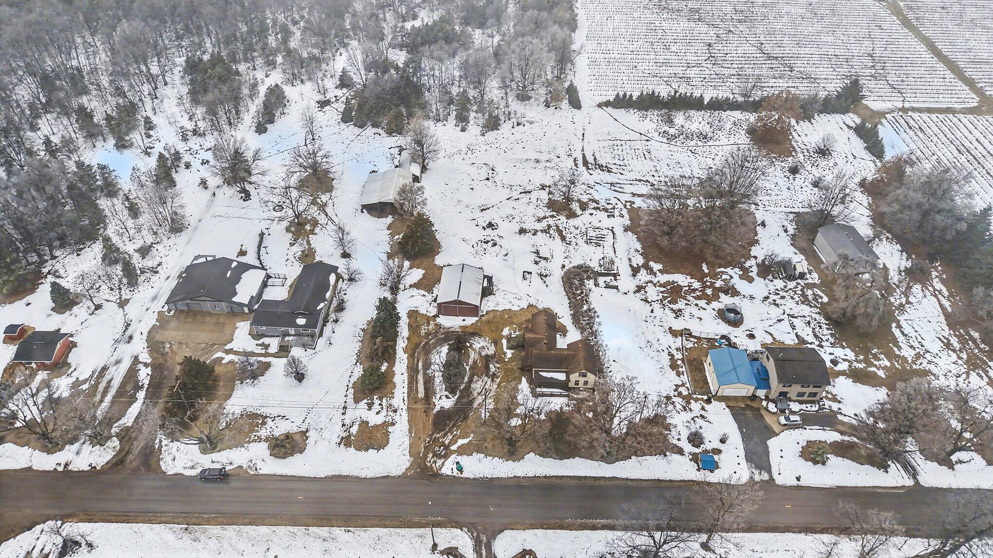 7353 South 88th Avenue Rothbury, MI 49452 - Photo 26 of 37 030_dji_20251226113505_0001_d_928