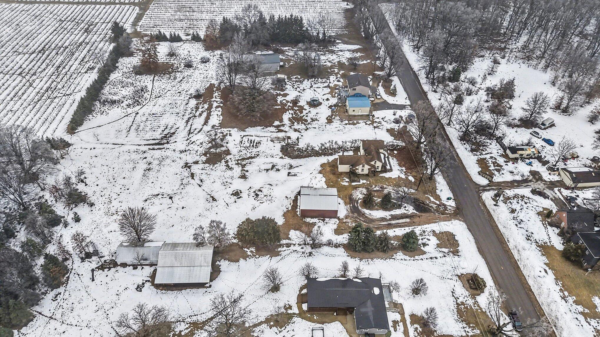 7353 South 88th Avenue Rothbury, MI 49452 - Photo 30 of 37 032_dji_20251226113541_0003_d_643