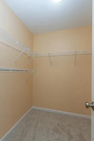 a view of a room with racks on the wall