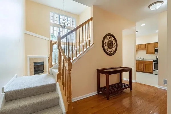 a view of a livingroom with furniture and a wooden floor