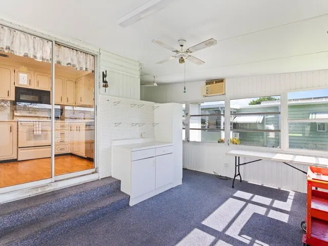 a room with furniture and a window