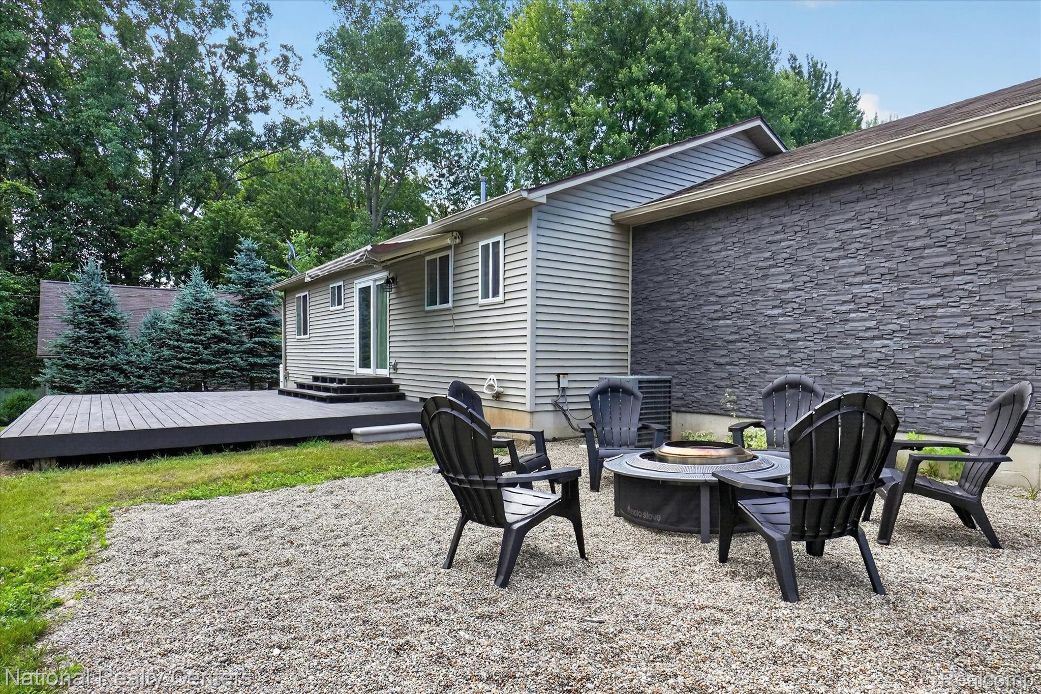 8280 West Rolston Road Linden, MI 48451 - Photo 31 of 47 Backyard outdoor entertaining space