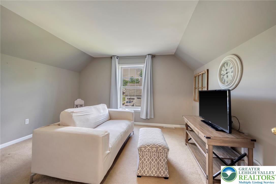 204 Bushkill Ridge Road Wind Gap, PA 18091 - Photo 23 of 48 A well-lit sitting room provides a comfortable retreat within this charming residence.