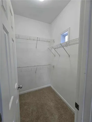 a view of a room with racks on the wall