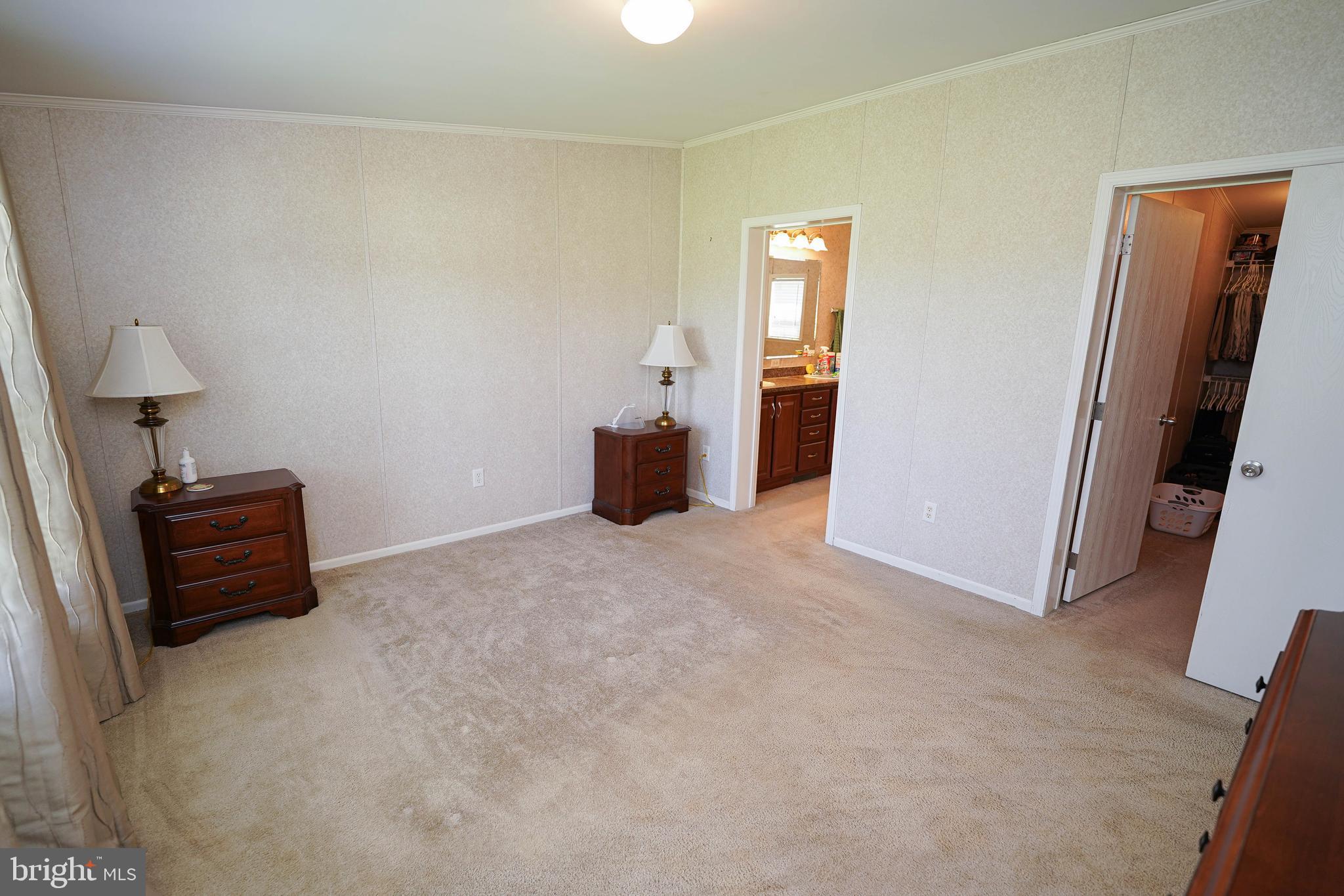 5846 Puckum Road Rhodesdale, MD 21659 - Photo 18 of 32 a view of an empty room and window