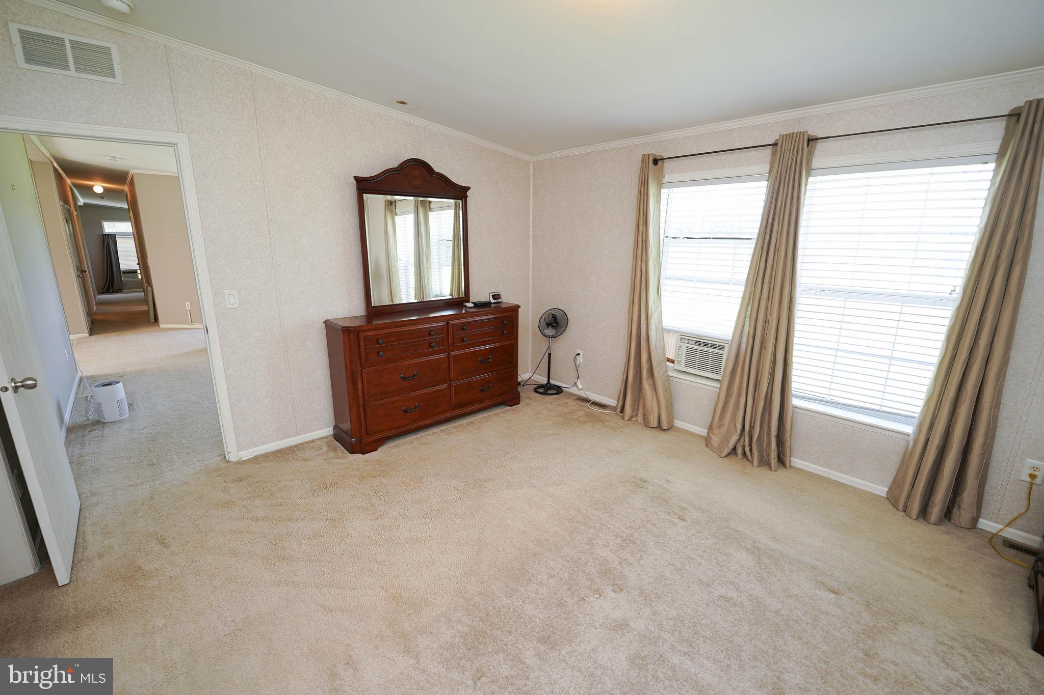 5846 Puckum Road Rhodesdale, MD 21659 - Photo 23 of 32 an empty room with windows and closet