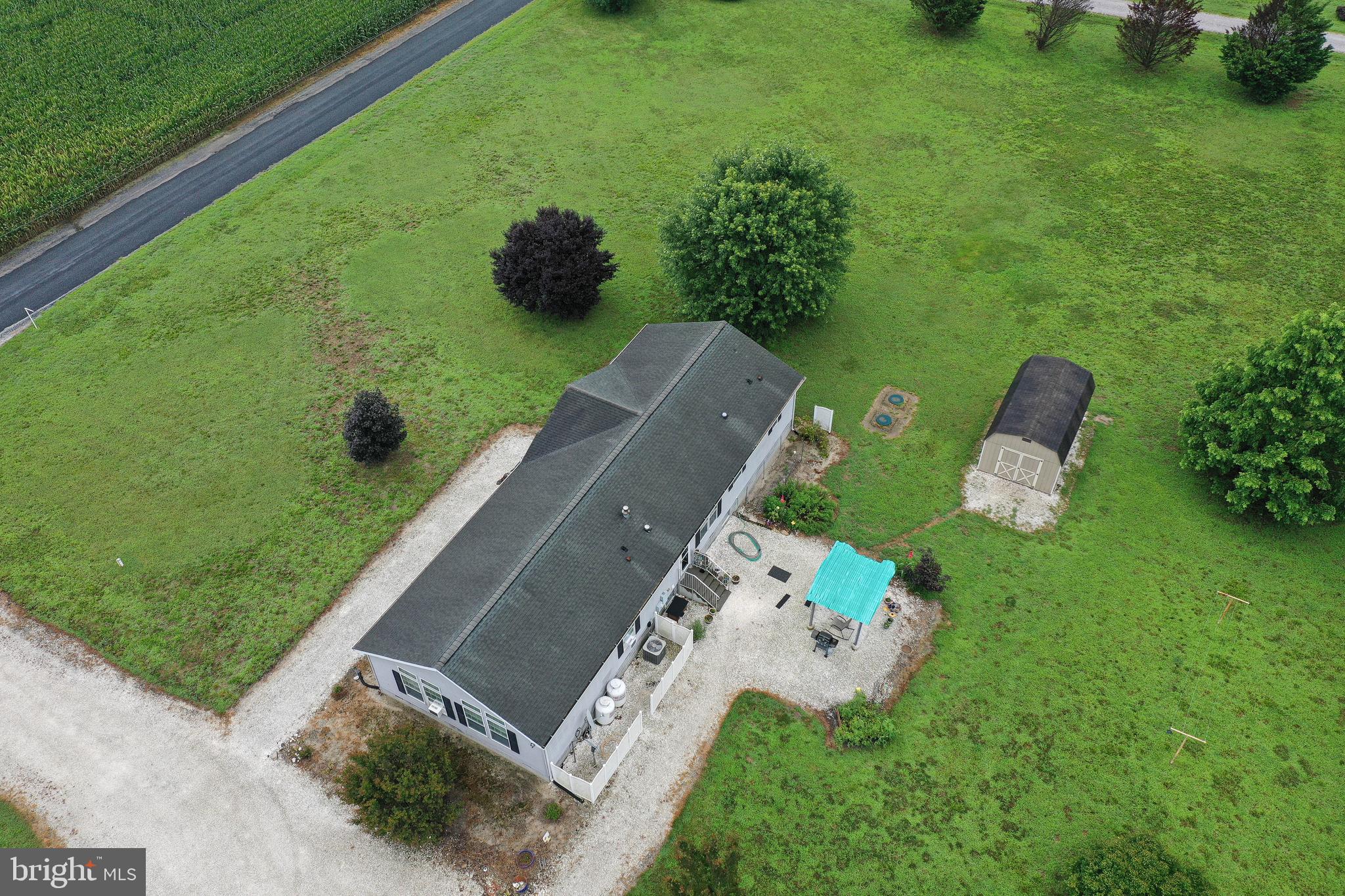 5846 Puckum Road Rhodesdale, MD 21659 - Photo 4 of 32 an aerial view of a house with a yard