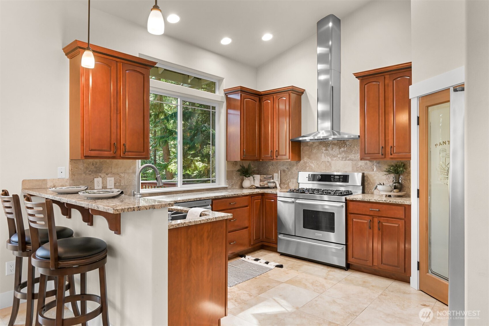 14 Gooseberry Circle Bellingham, WA 98229 - Photo 13 of 40 a kitchen with a stove sink and cabinets