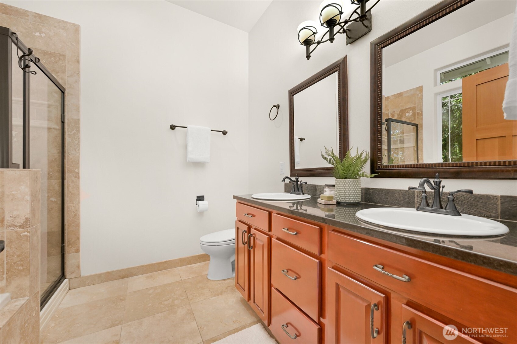 14 Gooseberry Circle Bellingham, WA 98229 - Photo 19 of 40 a bathroom with a double vanity sink toilet mirror and window