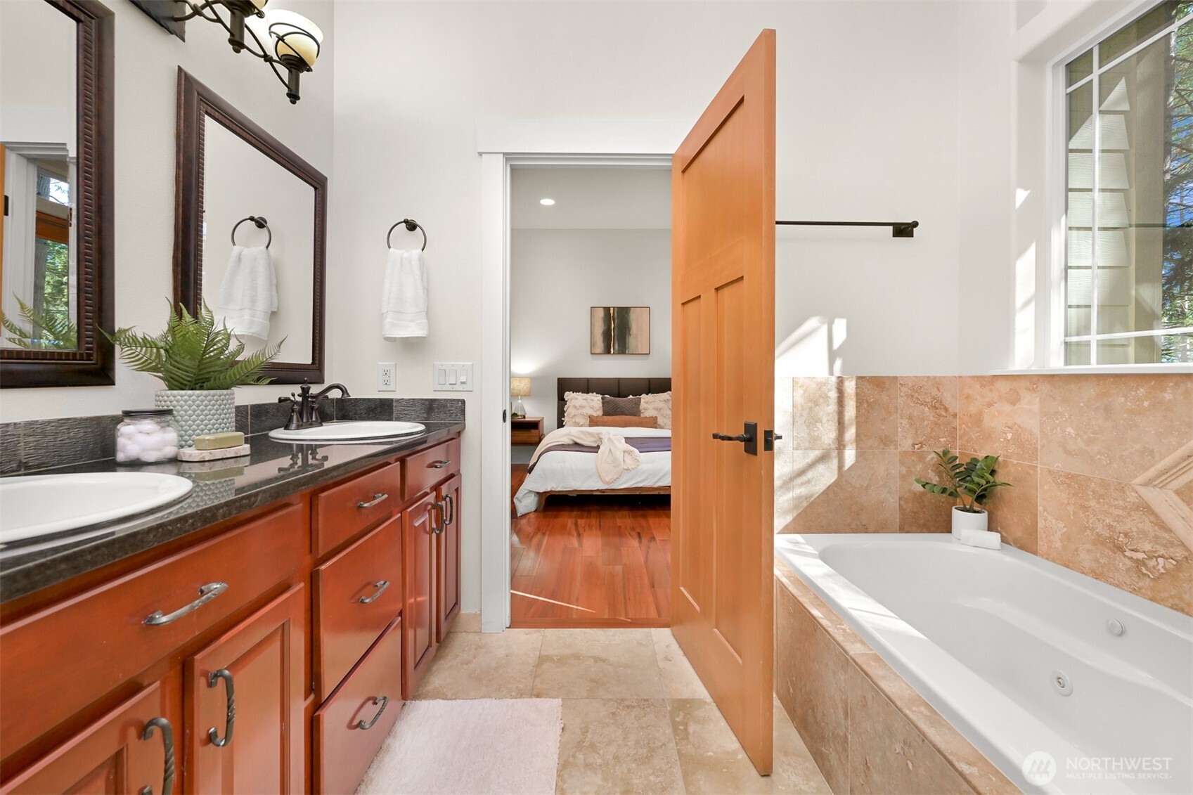 14 Gooseberry Circle Bellingham, WA 98229 - Photo 20 of 40 a en suite bathroom with a double vanity sink a mirror and a bathtub