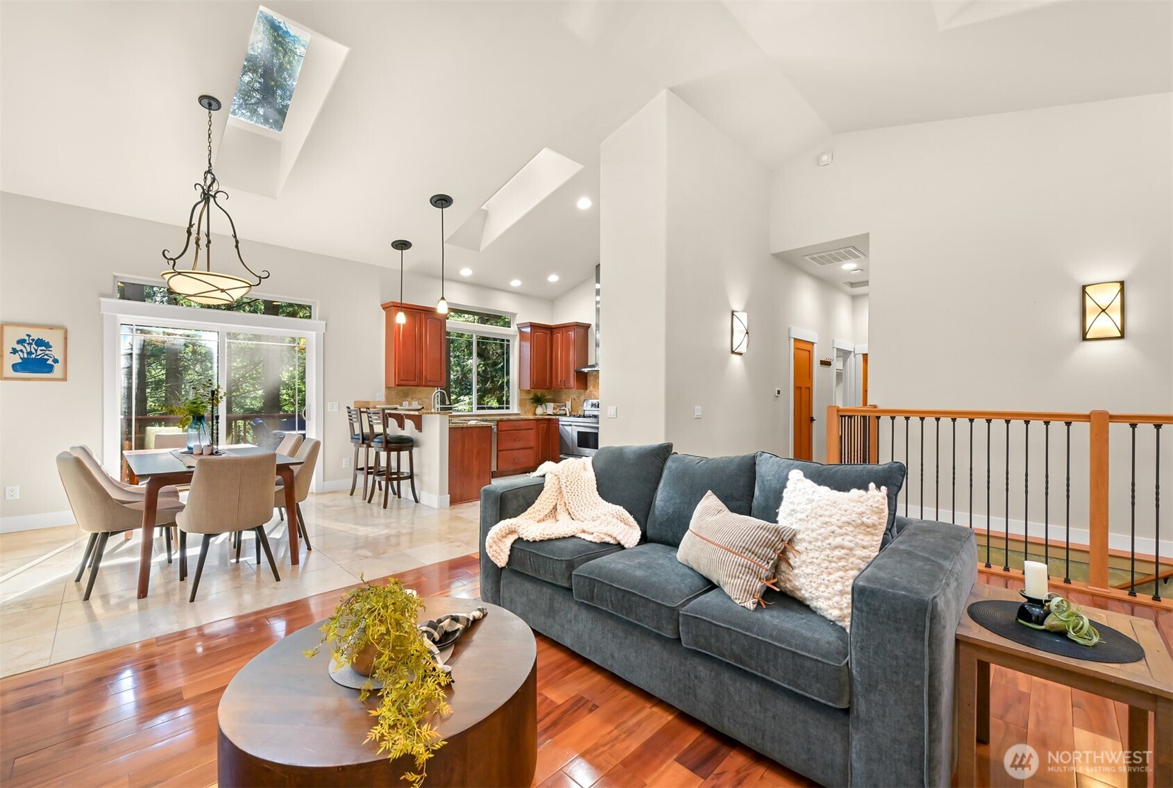 14 Gooseberry Circle Bellingham, WA 98229 - Photo 9 of 40 a living room with furniture and a chandelier