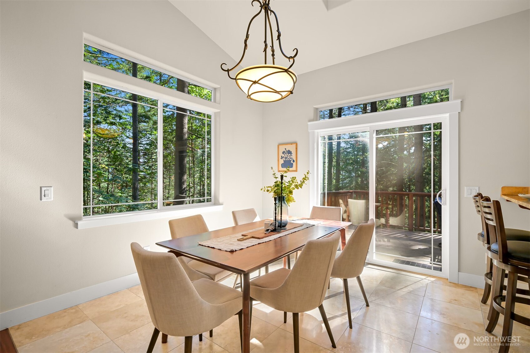 14 Gooseberry Circle Bellingham, WA 98229 - Photo 10 of 40 a dining room with furniture a chandelier and a rug