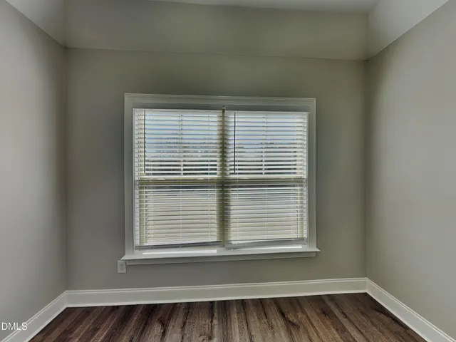 a view of a room that has a window