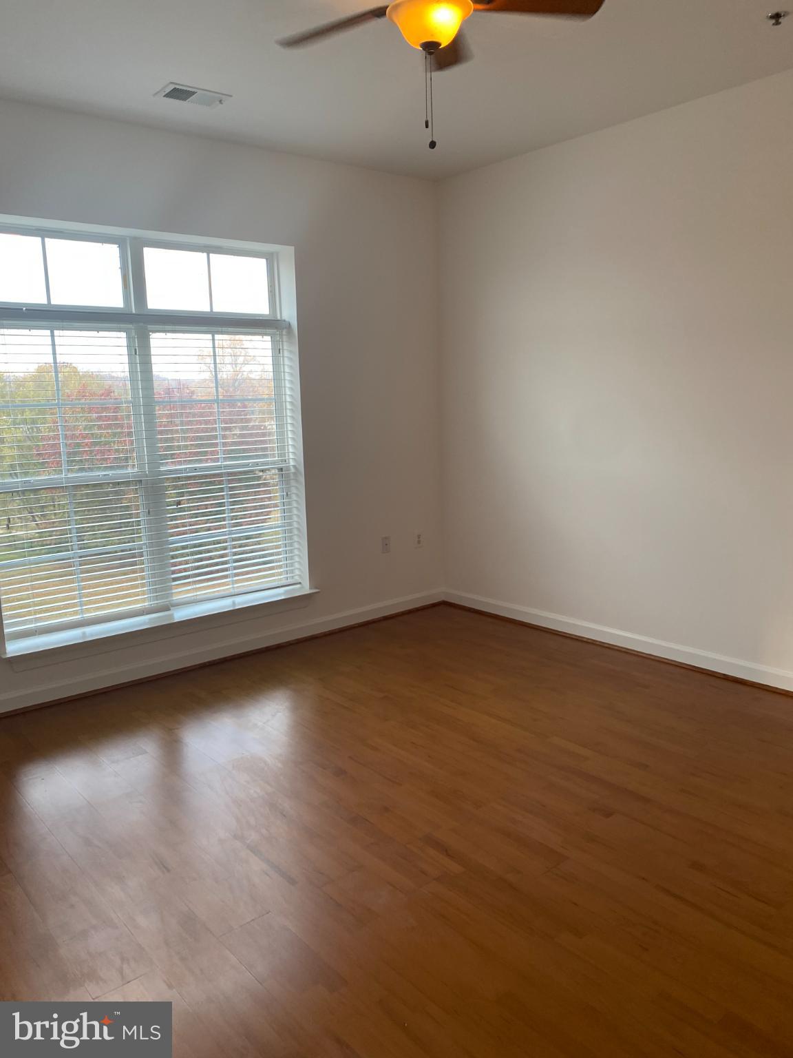 820 Belmont Bay Drive, Unit 301 Woodbridge, VA 22191 - Photo 11 of 76 Bright and airy space with natural light.