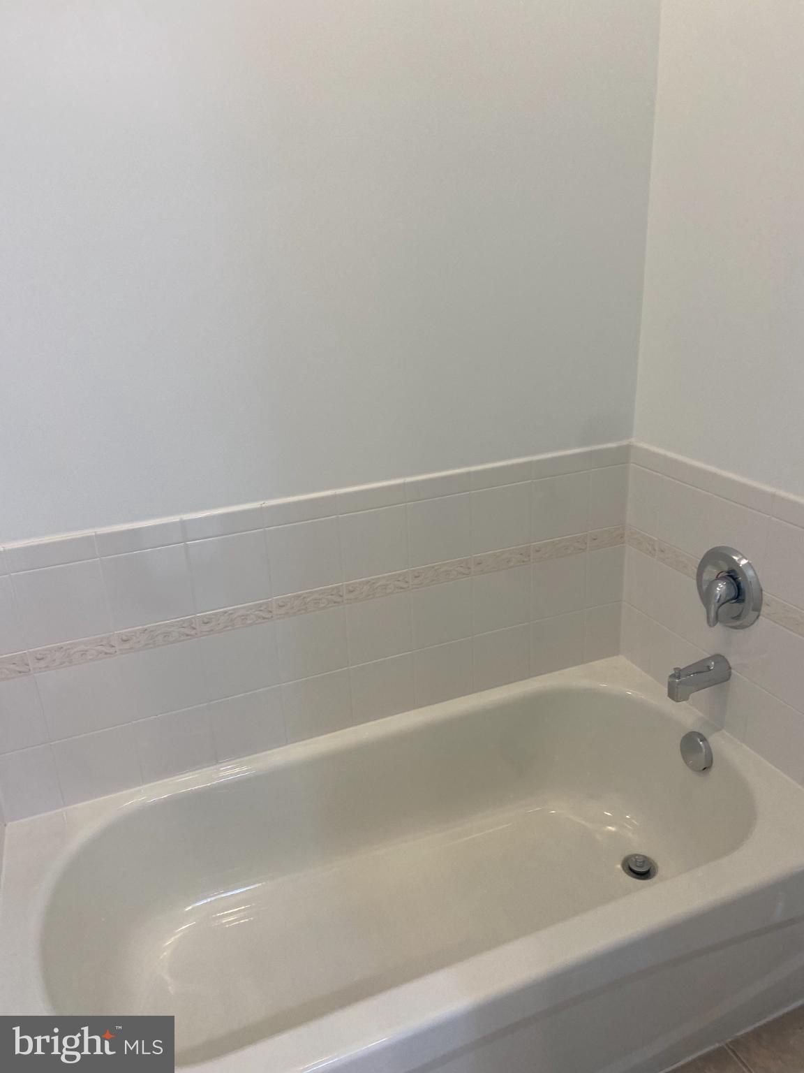 820 Belmont Bay Drive, Unit 301 Woodbridge, VA 22191 - Photo 14 of 76 Serene bathtub for ultimate relaxation.