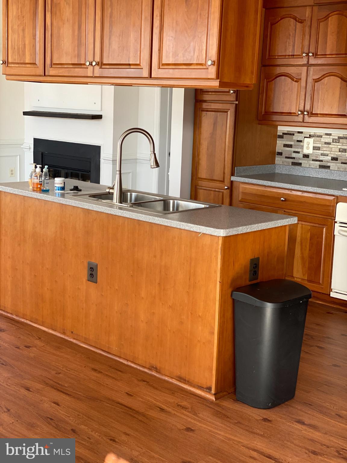 820 Belmont Bay Drive, Unit 301 Woodbridge, VA 22191 - Photo 29 of 76 Warm wood tones in a cozy kitchen space.