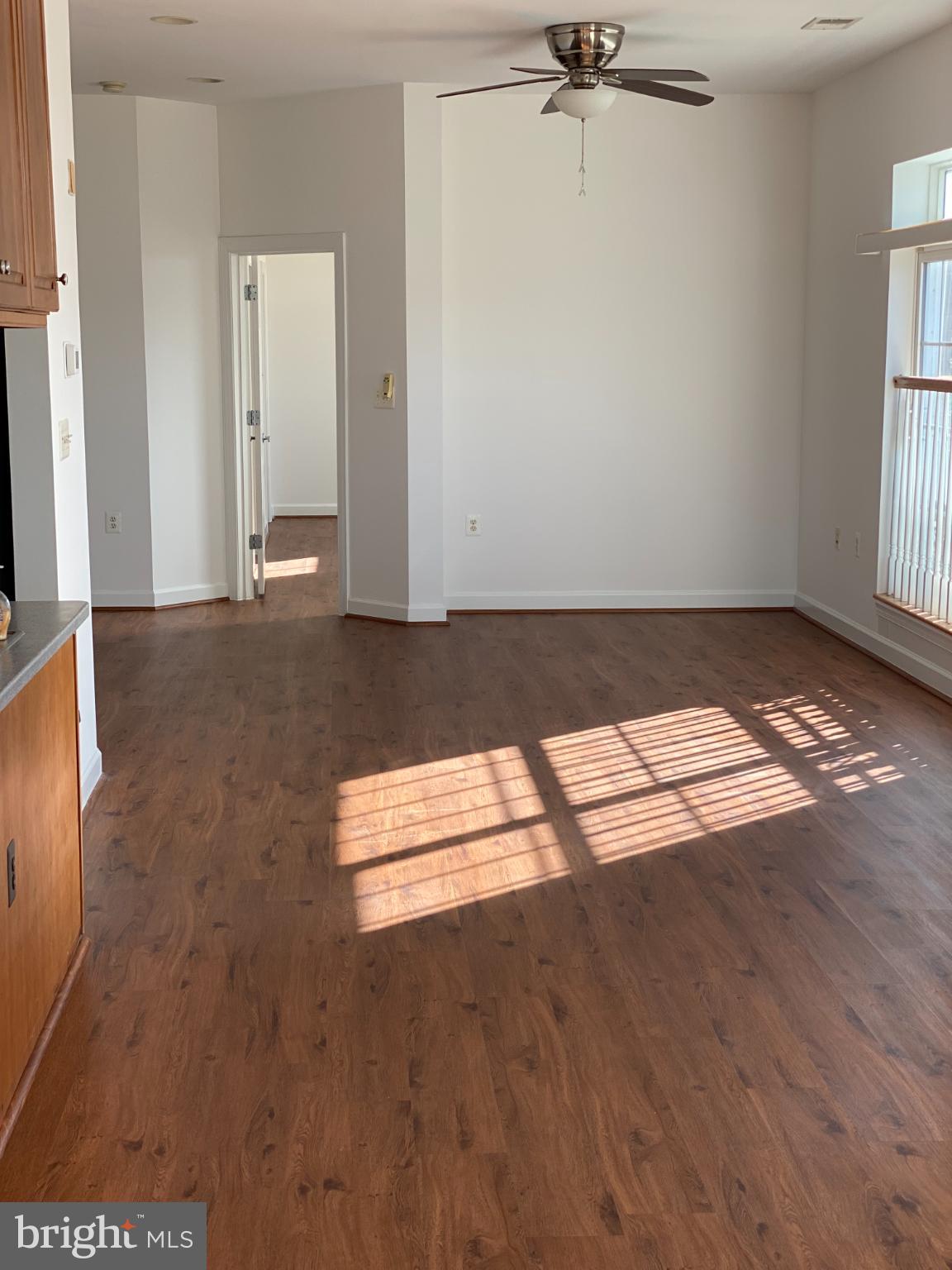 820 Belmont Bay Drive, Unit 301 Woodbridge, VA 22191 - Photo 32 of 76 Bright and airy open living space.