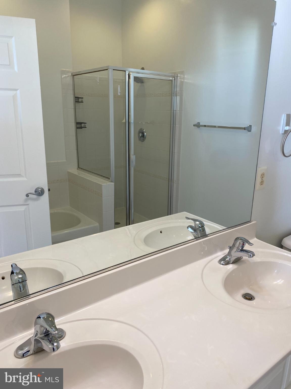 820 Belmont Bay Drive, Unit 301 Woodbridge, VA 22191 - Photo 34 of 76 Modern bathroom with sleek fixtures.