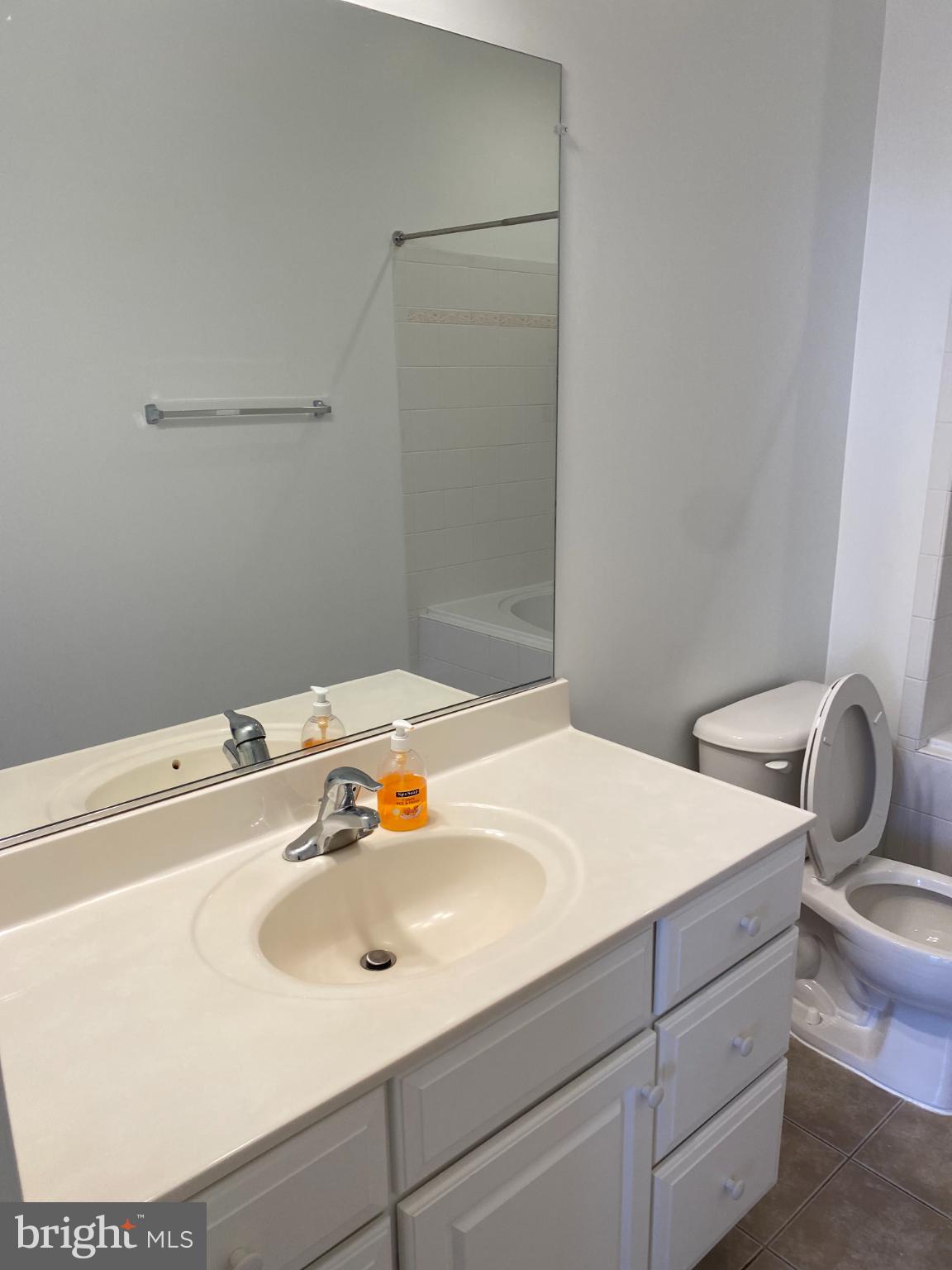 820 Belmont Bay Drive, Unit 301 Woodbridge, VA 22191 - Photo 39 of 76 Bright and airy bathroom with modern fixtures.