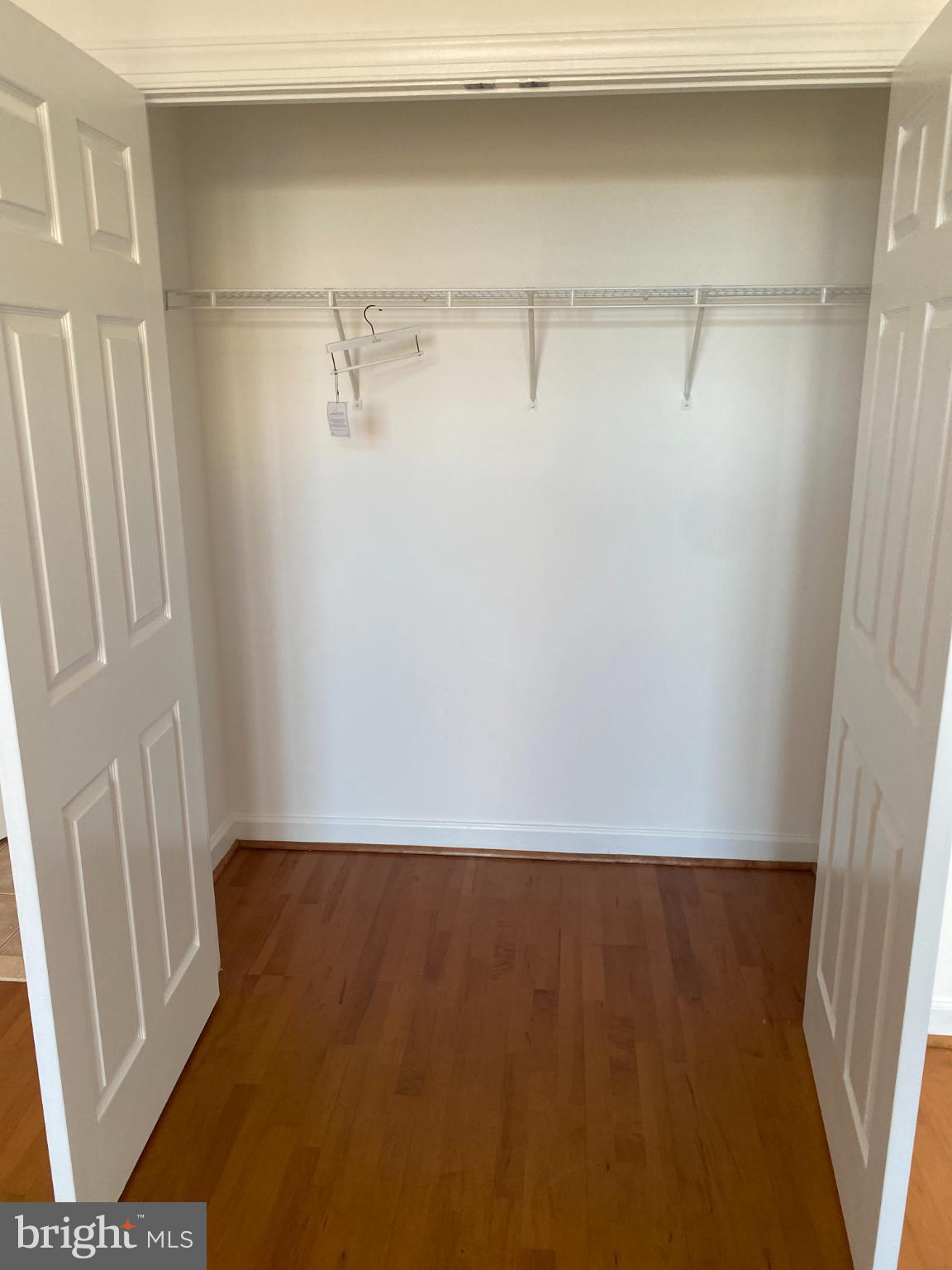 820 Belmont Bay Drive, Unit 301 Woodbridge, VA 22191 - Photo 42 of 76 Spacious closet with ample storage potential.