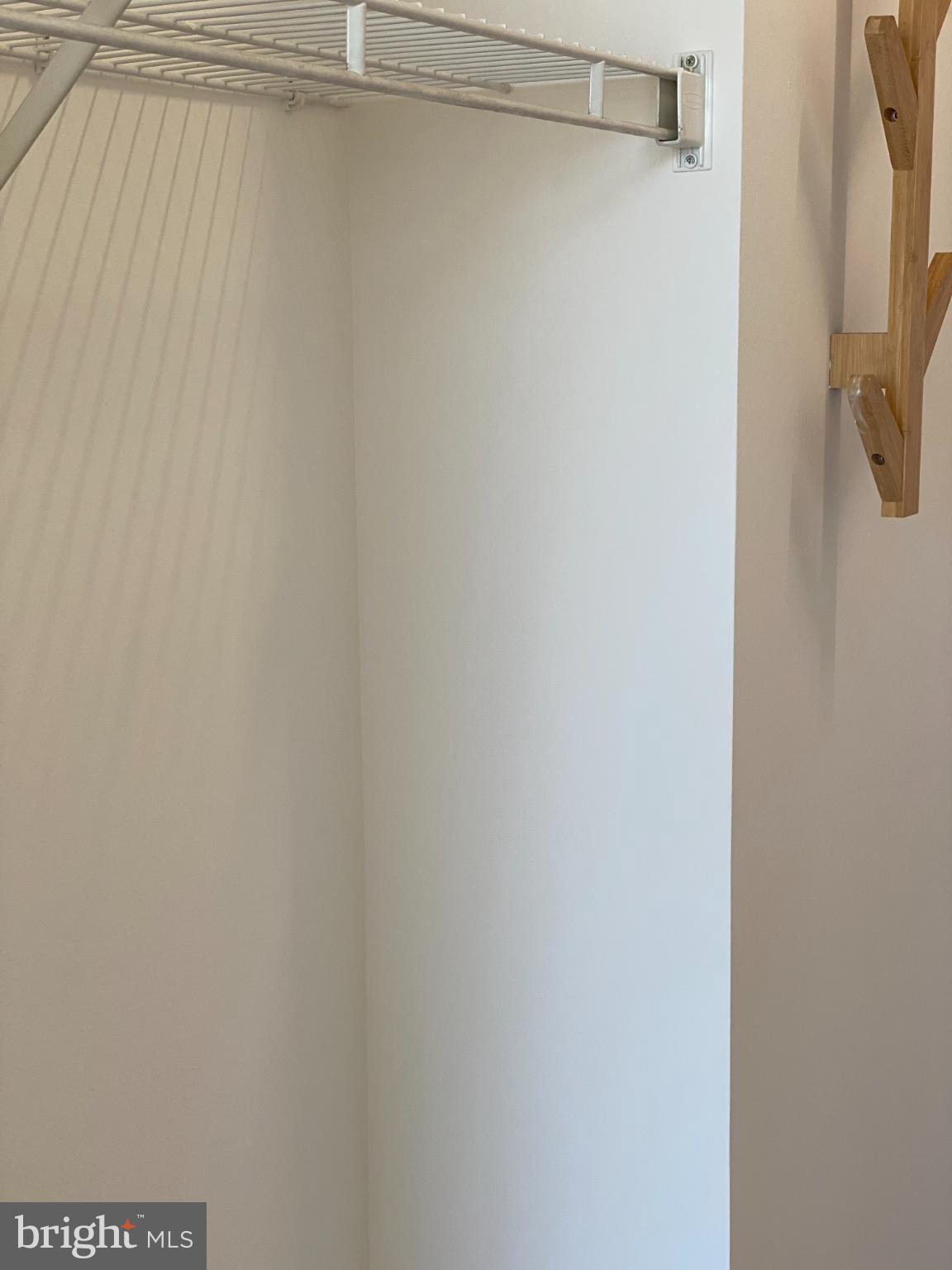 820 Belmont Bay Drive, Unit 301 Woodbridge, VA 22191 - Photo 47 of 76 Minimalist closet with sleek design.