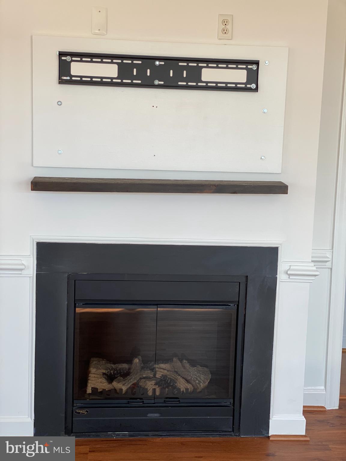 820 Belmont Bay Drive, Unit 301 Woodbridge, VA 22191 - Photo 50 of 76 Modern fireplace with sleek design elements.