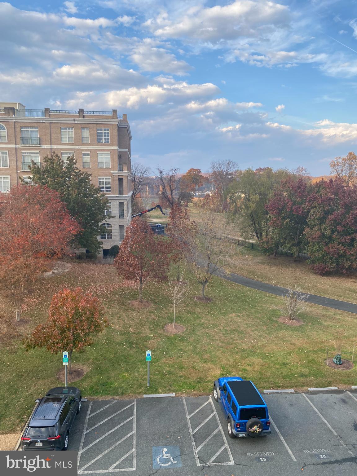 820 Belmont Bay Drive, Unit 301 Woodbridge, VA 22191 - Photo 62 of 76 Autumn hues frame a tranquil landscape.