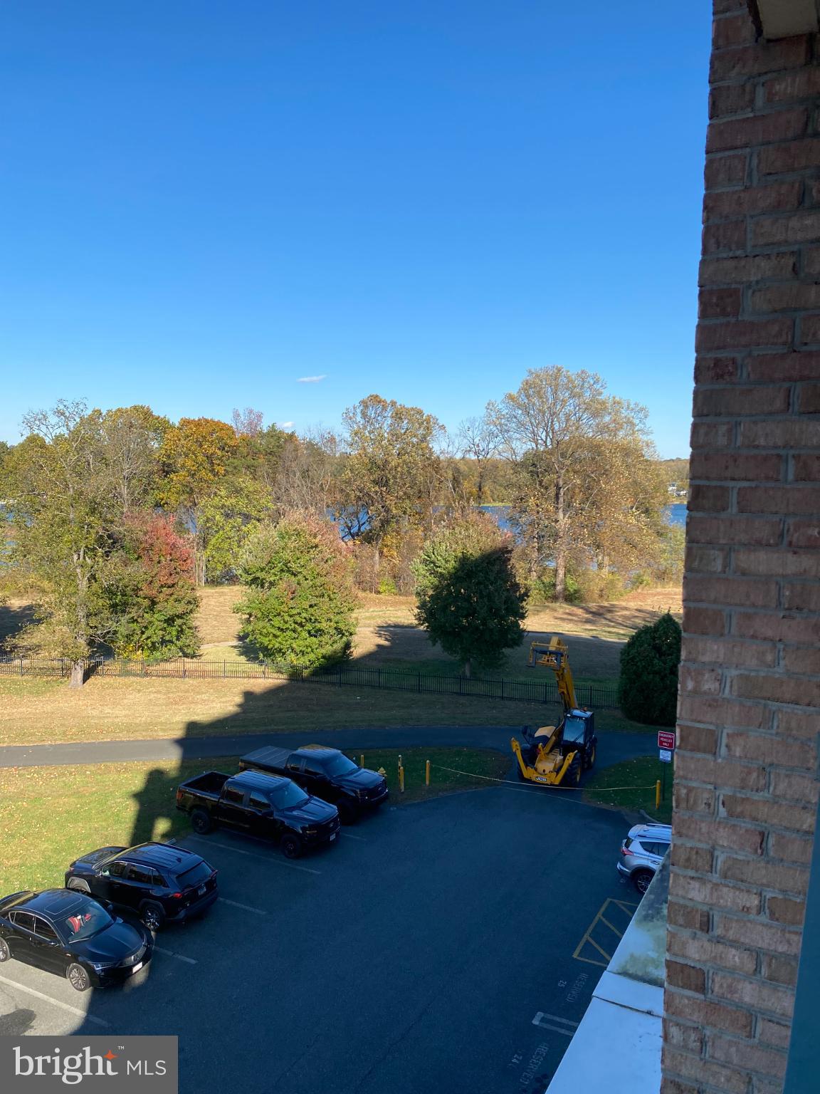 820 Belmont Bay Drive, Unit 301 Woodbridge, VA 22191 - Photo 63 of 76 Scenic view of serene waters and trees.