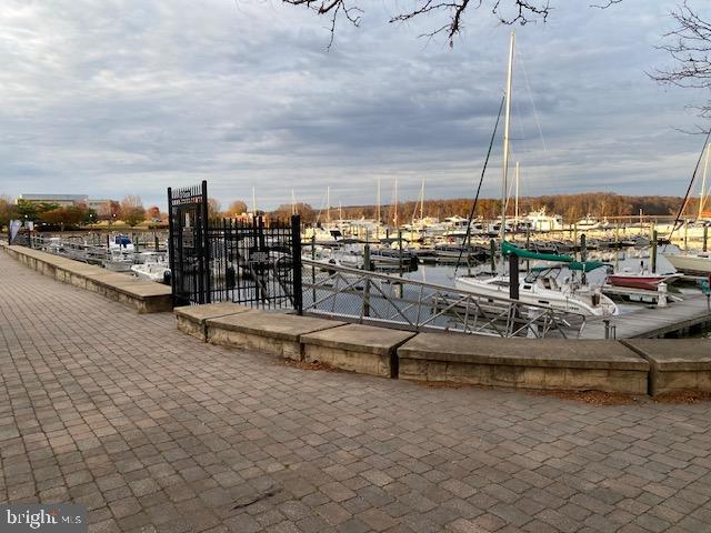 820 Belmont Bay Drive, Unit 301 Woodbridge, VA 22191 - Photo 74 of 76 Tranquil marina under a cloudy sky.