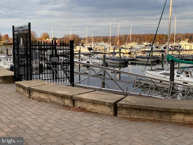 820 Belmont Bay Drive, Unit 301 Woodbridge, VA 22191 - Photo 75 of 76 Serene marina view at dusk.