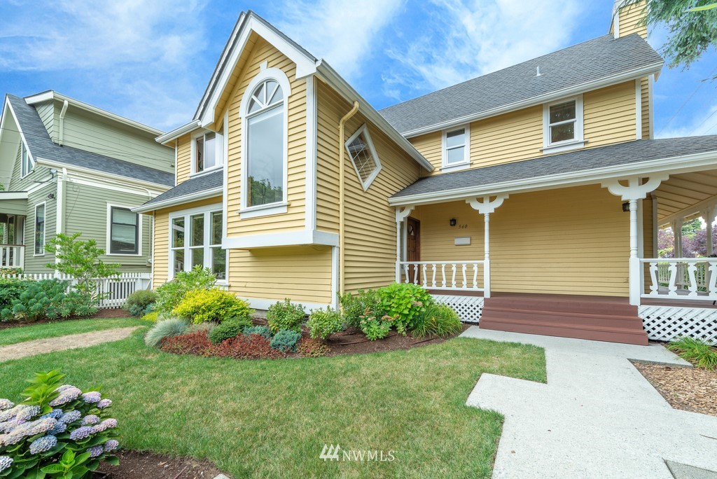 560 North 76th Street Seattle, WA 98103 - Photo 1 of 37 a front view of a house with garden