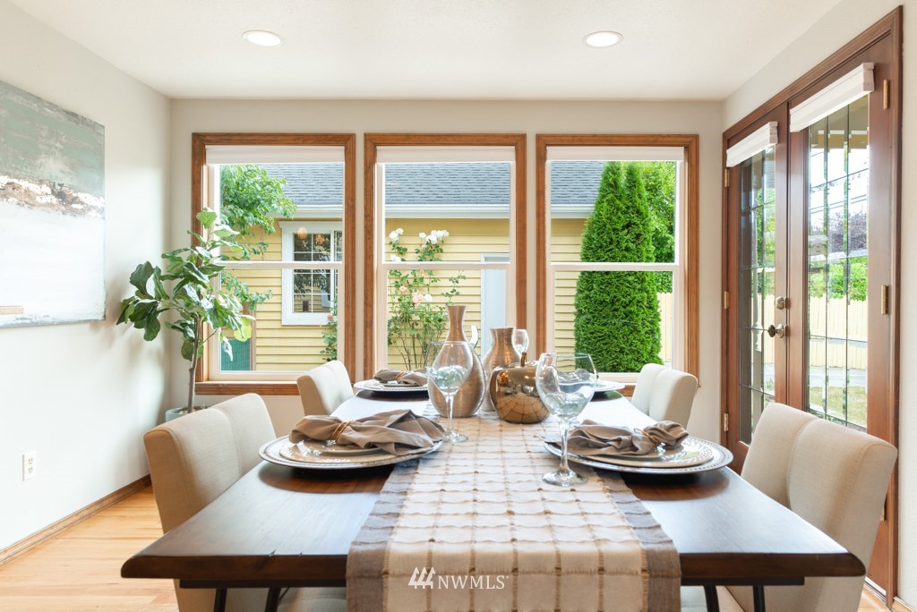 560 North 76th Street Seattle, WA 98103 - Photo 16 of 37 a living room with furniture and a large window
