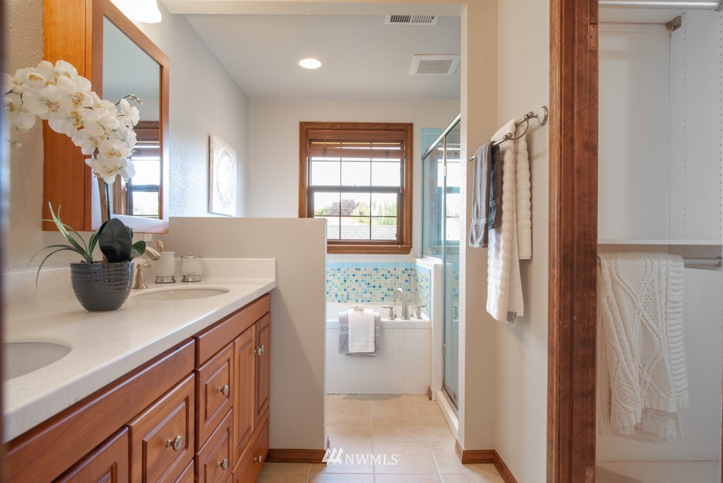 560 North 76th Street Seattle, WA 98103 - Photo 25 of 37 a kitchen with a sink and a refrigerator
