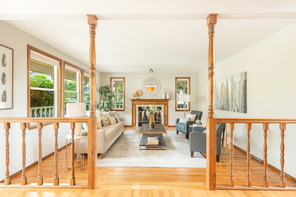 560 North 76th Street Seattle, WA 98103 - Photo 8 of 37 a living room with large windows